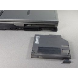 Замена оптического привода / дополнительного устройства Dell Inspiron 9100